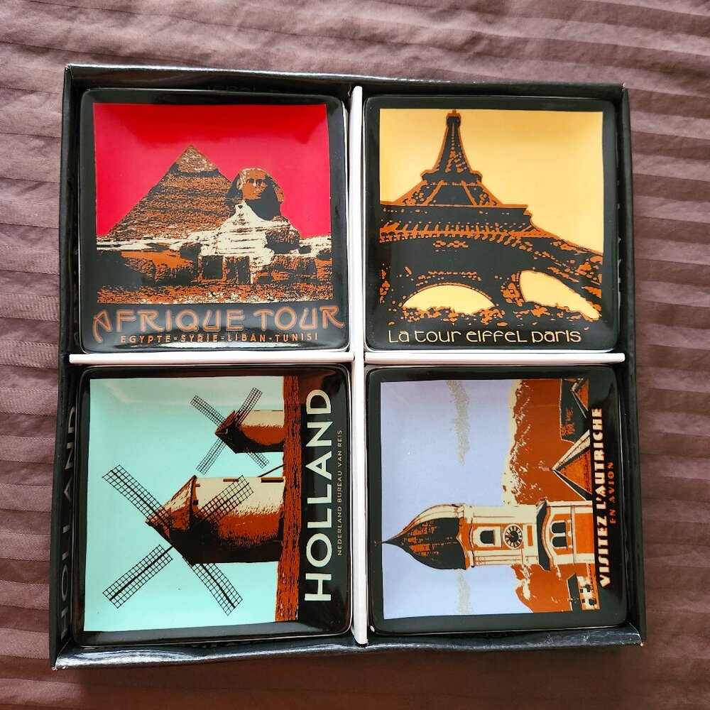 Vintage collector set of 4 hanging ceramic mini plates.